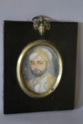(XIX-XX). Indian school, oval portrait miniature on ivory, study of a bearded man, unsigned,
