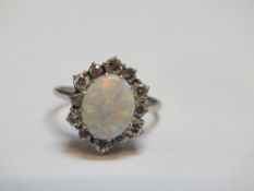 A HALLMARKED 18 CT WHITE GOLD OPAL AND DIAMOND RING, approx weight 3.3g, ring size M