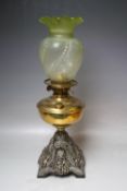 AN EARLY 20TH CENTURY OIL LAMP, with Duplex burner, brass reservoir, reticulated cast base and