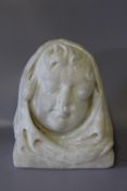 A CARVED ALABASTER HEAD, H 12.5 cm