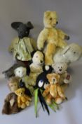 A COLLECTION OF VINTAGE AND MODERN TEDDY BEARS ETC, to include a vintage monkey hand puppet, a