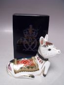 A ROYAL CROWN DERBY LIMITED EDITION 'HOLLY' THE DONKEY PAPERWEIGHT, a signature edition of 1500