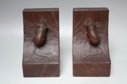 A PAIR OF ROBERT 'MOUSEMAN' THOMPSON OF KILBURN ADZED OAK BOOKENDS, each with a signature carved