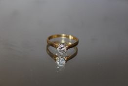 AN 18CT DIAMOND SOLITAIRE RING OF AN ESTIMATED 1/2 CARAT, ring size R