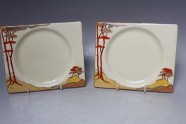 A PAIR OF CLARICE CLIFF BIZARRE RECTANGULAR SIDE PLATES IN THE CORAL FIRS PATTERN, printed marks