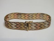 A 375 TRI COLOUR GOLD BRACELET, approx weight 29.2g