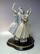 A LARGE LLADRO STYLE BALLET FIGURE GROUP, modelled as three ballet students and their teacher,