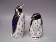A ROYAL CROWN DERBY ROCKHOPPER PENGUIN PAPERWEIGHT, silver stopper, with box, H 10.5 cm, together