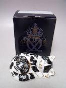 A ROYAL CROWN DERBY COLLECTORS GUILD MISTY THE CAT PAPERWEIGHT, gold stopper, with box, W 9 cm