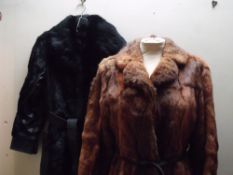 A LADIES VINTAGE BLACK LEATHER AND CONEY FUR COAT, complete with original belt, fully lined,