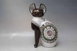 R.S. A 20th century modernist study of a seated cat, inscribed underneath R.S. 85, H 31 cm