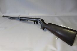 A BSA LINCOLN JEFFRIES .177 AIR RIFLE CIRCA 1907, having underlever cocking and tap loader, makers