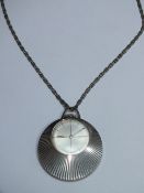 A SEIKO SUNBURST PENDANT WATCH ON CHAIN, W 3.25 cm