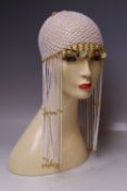 A WHITE AND GOLD BEADED RETRO / 1920S STYLE FLAPPER HEADDRESS / CAP