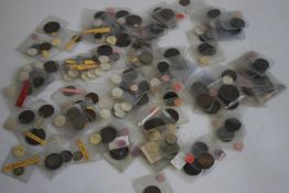 A BOX OF BRITISH AND WORLD COINS, to include a selection of half pennies, Irish issues and minor