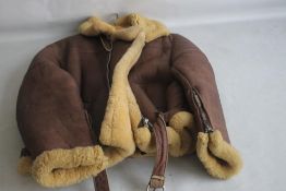A SHEEPSKIN LINED PILOT'S FLYING JACKET