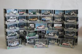 THIRTY EIGHT CARARAMA BOXED DIECAST POLICE VEHICLES, 1:43 scale, (38)