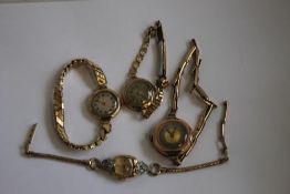 FOUR GOLD LADIES' WRISTWATCHES, to include a 14ct Benrus example on a plated strap (4)