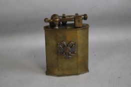 AN ANTIQUE FRENCH MINISTRE FINANCES BRASS LIFT ARM TABLE LIGHTER, with double headed eagle badge