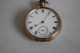 A GENTLEMAN'S 9ct GOLD OPEN FACED TOP WIND POCKET WATCH, white enamel dial with Roman Numeral