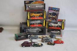 A COLLECTION OF BOXED AND LOOSE DIECAST VEHICLES, to include examples by Burago, Corgi, Vanguards