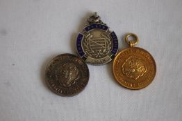 OLDBURY URBAN DISTRICT EDUCATION COMMITTEE 9CT GOLD MEDAL, also includes a silver example, along