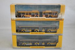 MERCEDES-BENZ CITARO UNIVERSITY OF EAST LONDON BUS, 1:76 boxed Limited Edition together with two