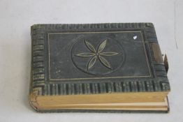 A VICTORIAN PHOTOGRAPH ALBUM AND CONTENTS, mostly portraits and full length figures.