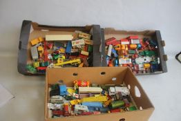 THREE TRAYS OF UNBOXED PLAYWORN TRUCKS, LORRIES, BUSES ETC.