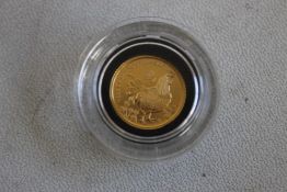 ROYAL MINT, 2017 GOLD 1/10 OZ LUNAR YEAR OF THE ROOSTER, in box of issue with COA.