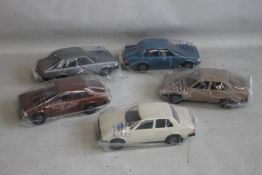 FIVE NYRHINEN TOYOTA COROLLA PLASTIC CARS, in original plastic wrapping, Made In Finland