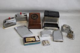 A COLLECTION OF VINTAGE AND RETRO CIGARETTE AND TABLE LIGHTERS, to include a boxed Hudson watch