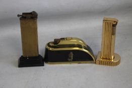 THREE VINTAGE TABLE LIGHTERS BY THORENS, POLO AND BENLOW