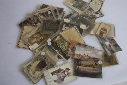 A COLLECTION OF MILITARY INTEREST POSTCARDS, MAINLY WWI, to Include real photograph types.