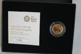 ROYAL MINT, 2019 GOLD 1/10 OZ LUNAR YEAR OF THE PIG COIN, in box of issue with COA.