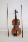 A FRENCH MADE ONE PIECE BACK VIOLIN AND BOW LABELLED A. SALVATOR ALSO INITIALLED J.L.T, A/F