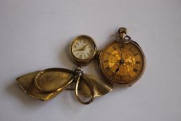 A SMALL 9ct GOLD LADIES FOB WATCH, with engraved case, along with a gold plated ladies' 