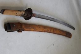 A JAPANESE KATANA SWORD WITH DECORATED IRON SUBA, black lacquer scabbard (with brown leather