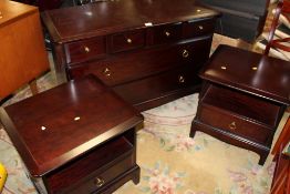 A STAG MINSTREL BEDROOM CHEST TOGETHER WITH PAIR OF BEDSIDES
