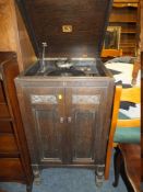 AN OAK CASED HMV GRAMOPHONE