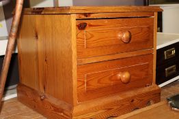 A HONEY PINE TWO DRAWER CHEST