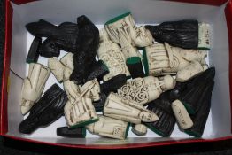 A BOX OF MODERN RESIN CHESS PIECES