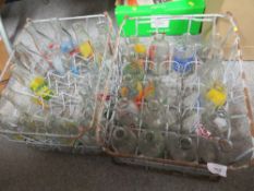 TWO VINTAGE MILKMANS CARRY CRATES CONTAINING VINTAGE MILK BOTTLES