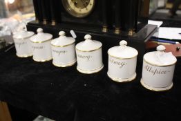 A SET OF SIX GILDED QUEENSBURY CHINA SPICE JARS