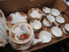 A ROYAL ALBERT OLD COUNTRY ROSES CHINA SIX PERSON TEA SET Condition Report:The teapot has a chip
