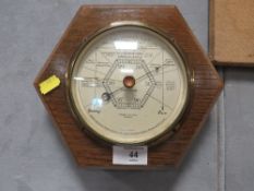 AN OAK FRAMED HEXAGONAL SHAPED WALL BAROMETER BY ROBERT LOVE & SON GREENOCK