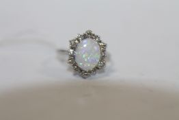 A HALLMARKED 18 CT WHITE GOLD OPAL AND DIAMOND RING, approx weight 3.3g, ring size M