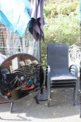 A BLACK GARDEN SET OF 4 CHAIRS, TABLE AND A PARASOL