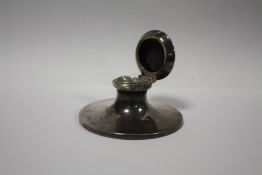 A HALLMARKED SILVER CAPSTAN INKWELL