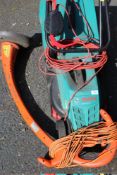 A BOSCH ROTAK 32R ELECTRIC LAWNMOWER TOGETHER WITH A FLYMO STRIMMER